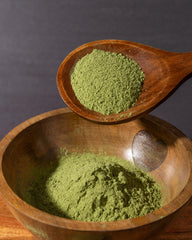 Phresh Greens glass with mixed beverage showcases nutrient-dense greens.