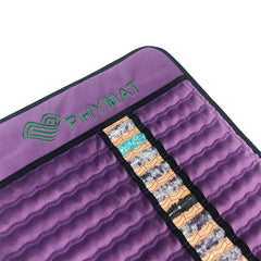 PHYMAT pad on chair demonstrates office use for back relief.