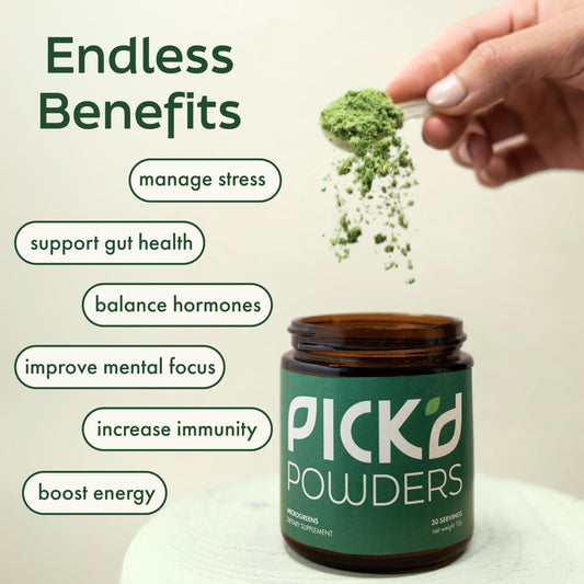 PICKD POWERS organic greens powder jar on kitchen counter for daily nutrition