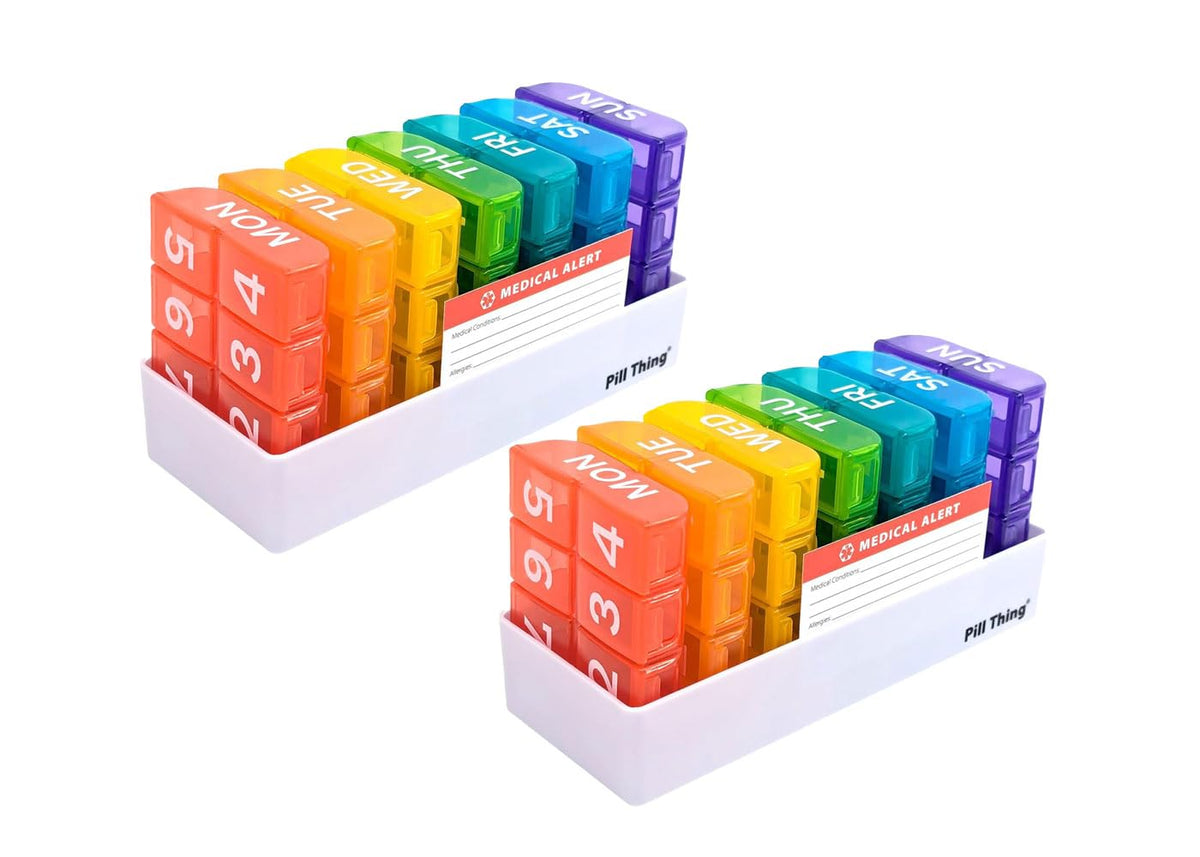 PILL THING large weekly pill organizer with tray for easy daily dosing.