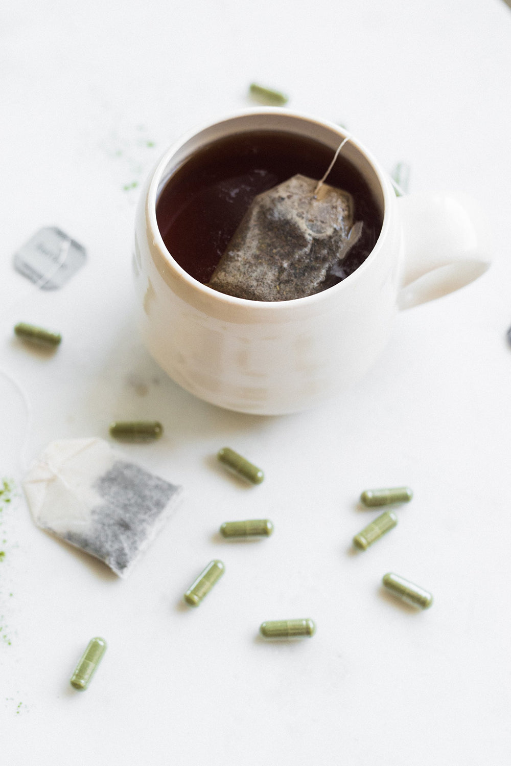 Pines barley grass tablets on a supplement shelf to emphasize plant-based nutrition.