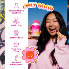 Pink Stork bottle pouring two gummies for a simple teen daily ritual.
