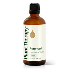 Plant Therapy Patchouli Oil bottle for grounding aromatherapy and skincare routines.
