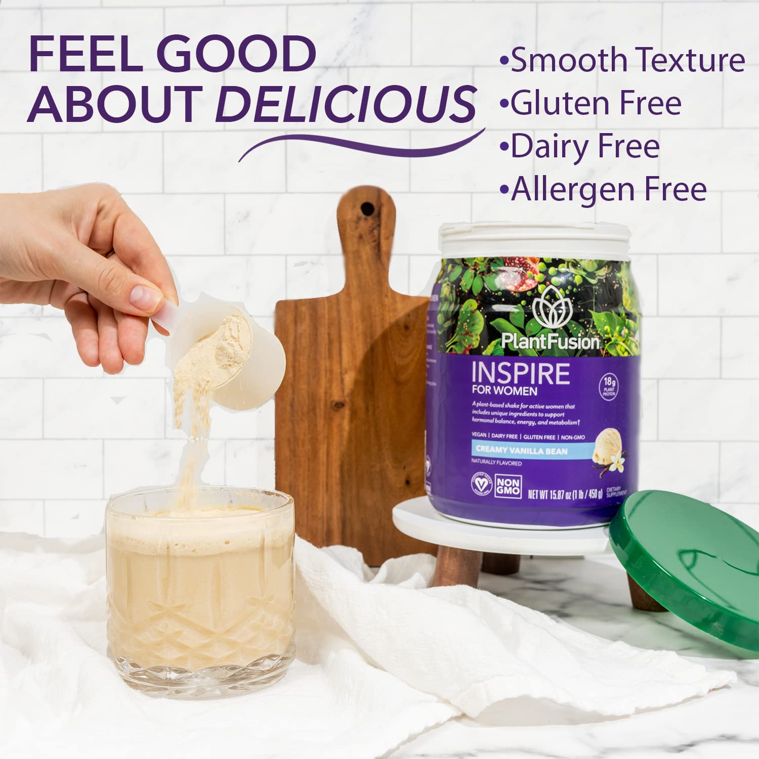 PlantFusion Inspire Women shake in glass, creamy vanilla texture.