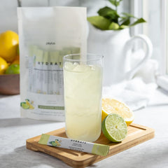 Plexus Hydrate Lemon Lime scoop with powder for easy electrolyte replenishment