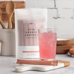 Plexus Slim Hunger Control on-the-go packet dissolving in water for a quick morning routine.