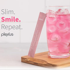 Plexus Slim Microbiome Activating raspberry flavor glass showing refreshing taste.