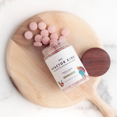 Chewables being dispensed from the Plexus XFactor Kids bottle.