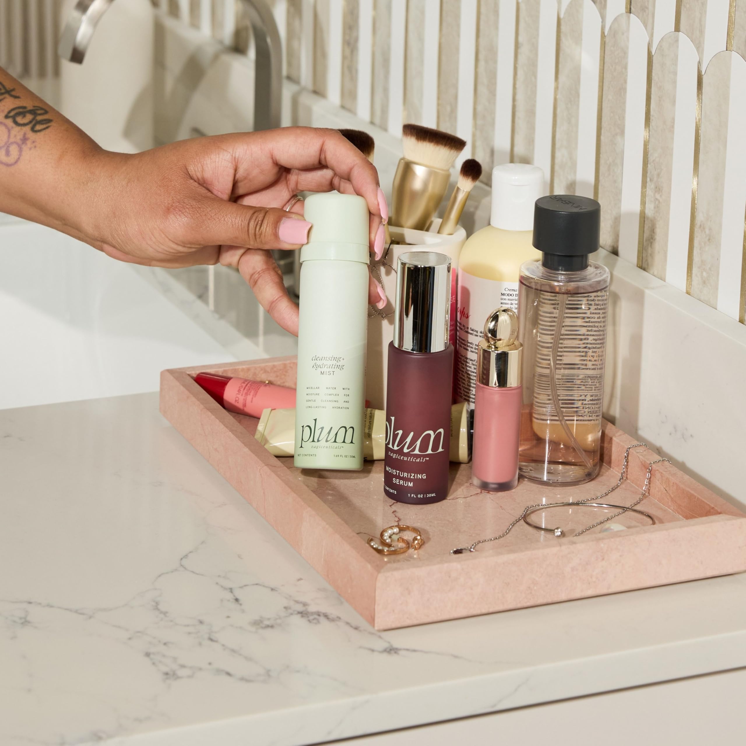 PLUM Vagiceuticals serum and mist together illustrate a simple two-step hydration routine.