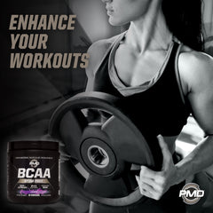 PMD BCAA grape athlete holding shaker for recovery between sets.