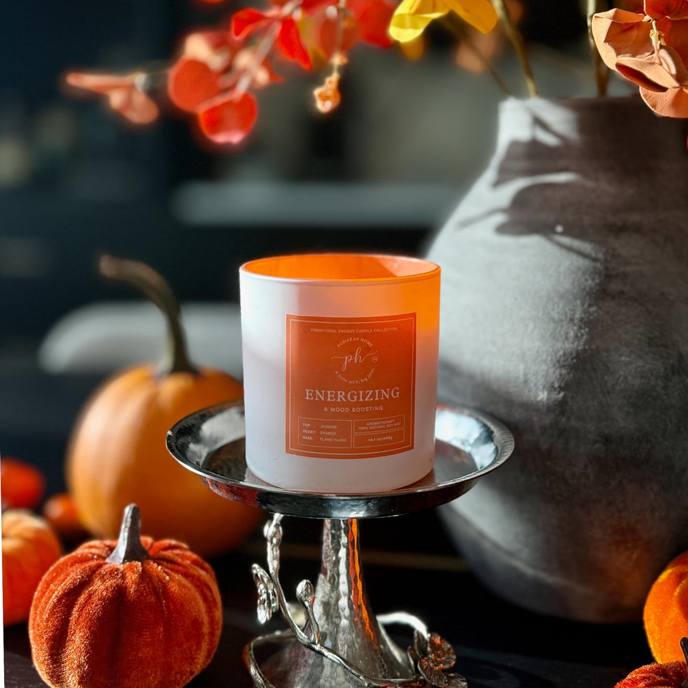 Podaras Home XL candle lit on table for mood elevation