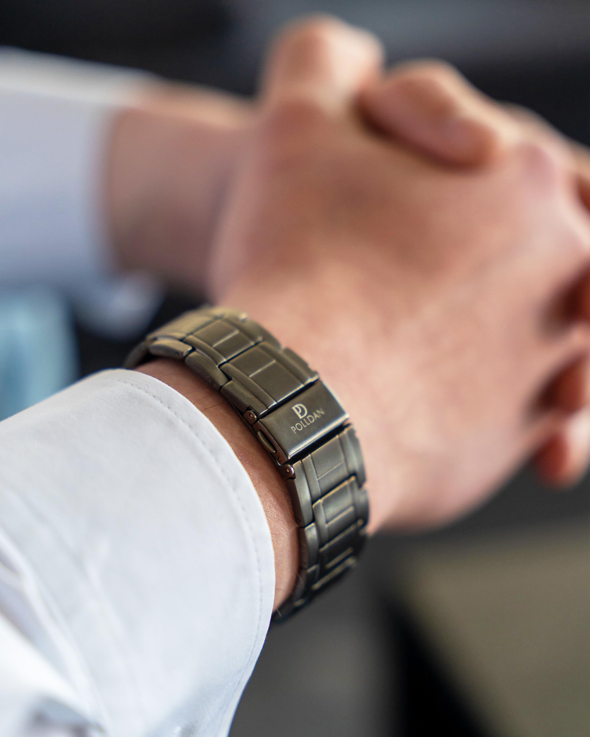 POLLDAN titanium alloy wristband highlighting durable, tarnish‑resistant construction.