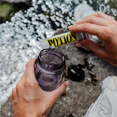 Potion Supernatural Hydration glass with drink highlights a crisp, clean hydration moment.