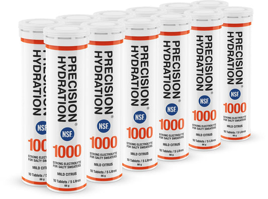 Precision Hydration electrolyte tablets orange tube pour for quick hydration during workouts.