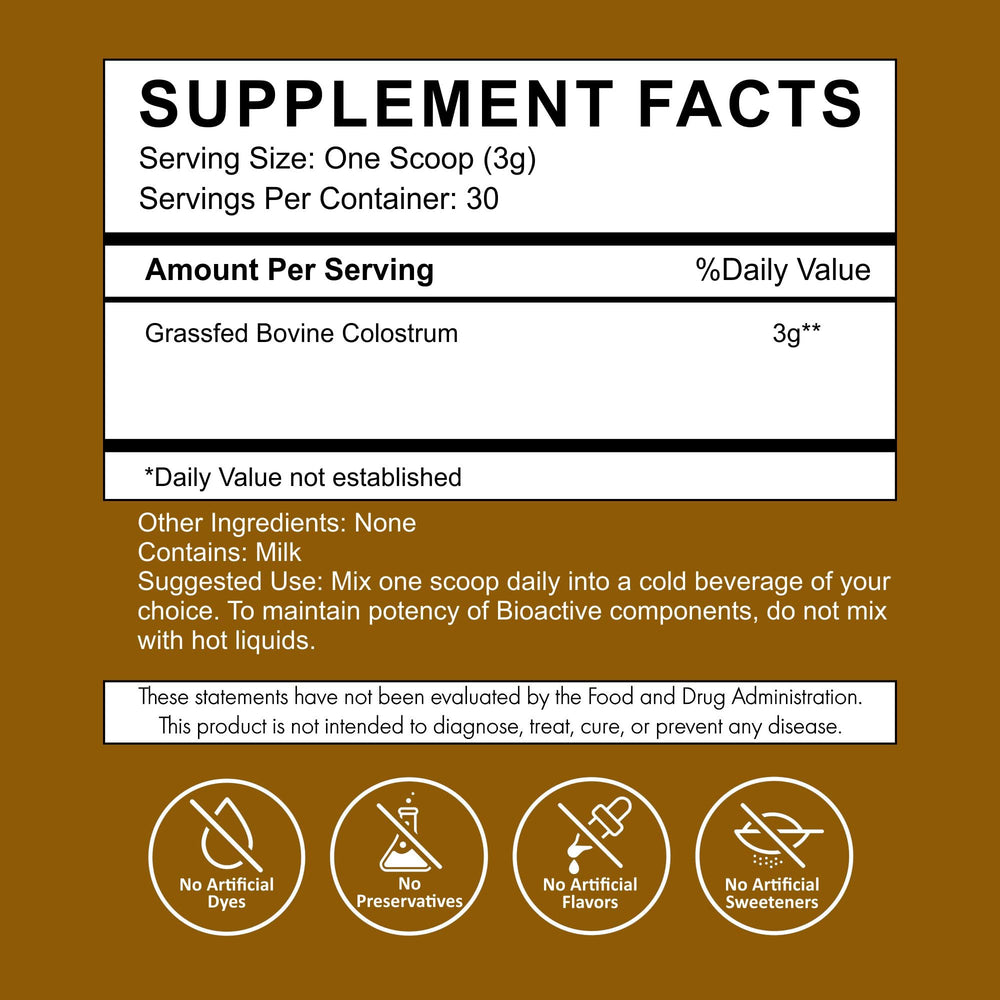 Primal Being grassfed colostrum powder spoon for precise daily serving.