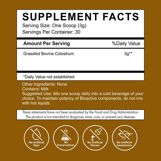 Primal Being grassfed colostrum powder spoon for precise daily serving.