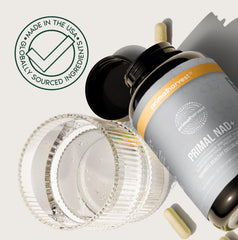 Primal Harvest NAD+ Plus glass bottle on white surface for health-supporting routine.