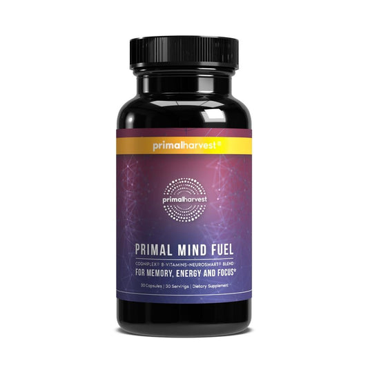 Primal Mind Fuel bottle from Primal Harvest on a desk, promoting focused daily use