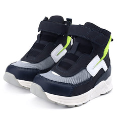 Princepard kids' orthopedic shoes in green, shown from side view to highlight balance support.