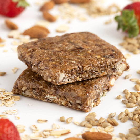 PROBAR MEAL Bar ingredients closeup with oats, nuts, and berries.