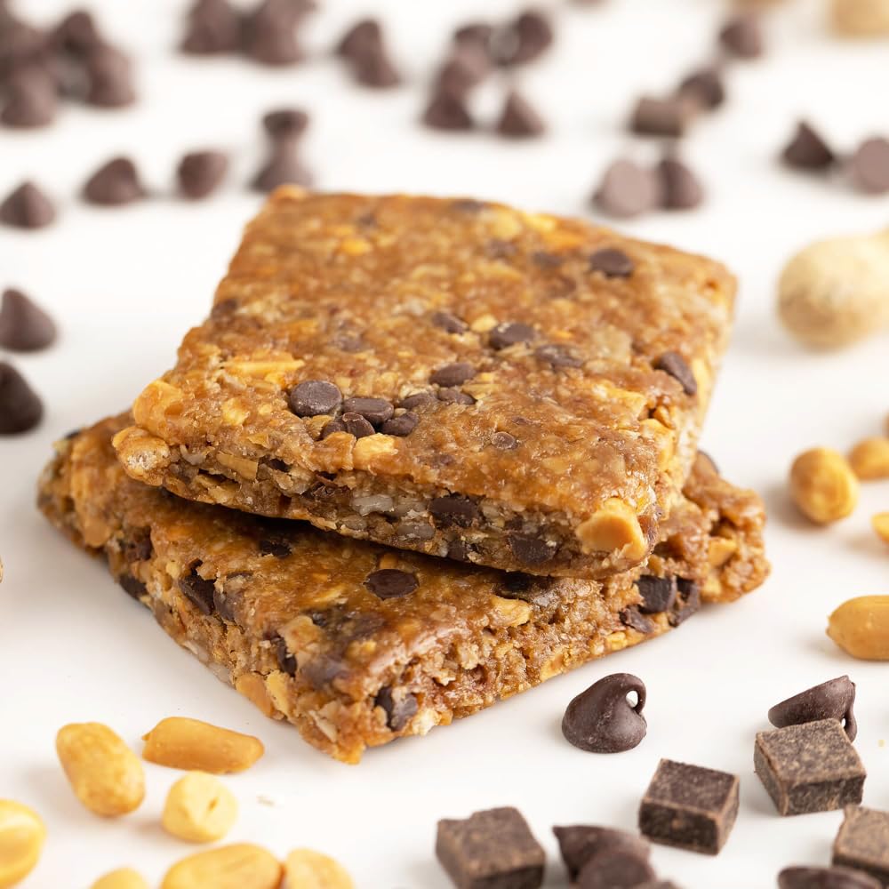 Close-up of PROBAR MEAL Bar texture with oats, nuts, and chocolate.
