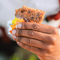 PROBAR MEAL Bar cross-section reveals wholesome ingredients and energy.