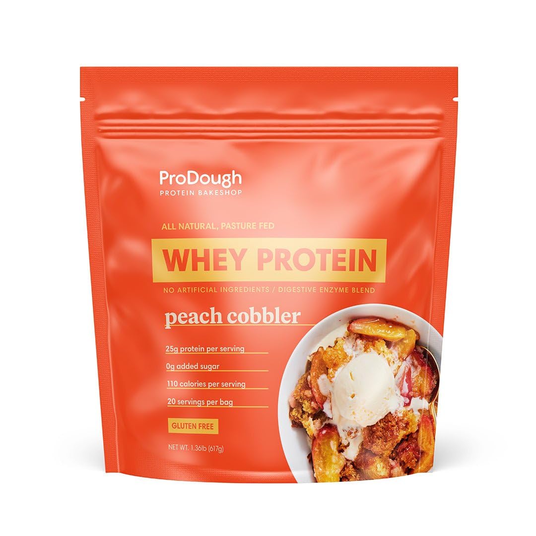 ProDough Peach Cobbler whey bottle highlights gourmet protein for easy daily shakes.