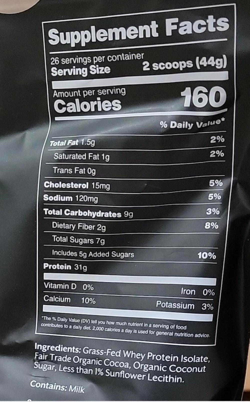 Promix Nutrition whey protein isolate chocolate close-up of raw cocoa particles and blend