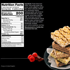 Close-up texture of ProtiWise Raspberry Wafers highlighting crisp crunch.
