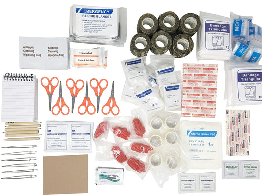 PSA Ops Gear Scout IFAK Six-Pack contents arranged for quick packing and quick access.