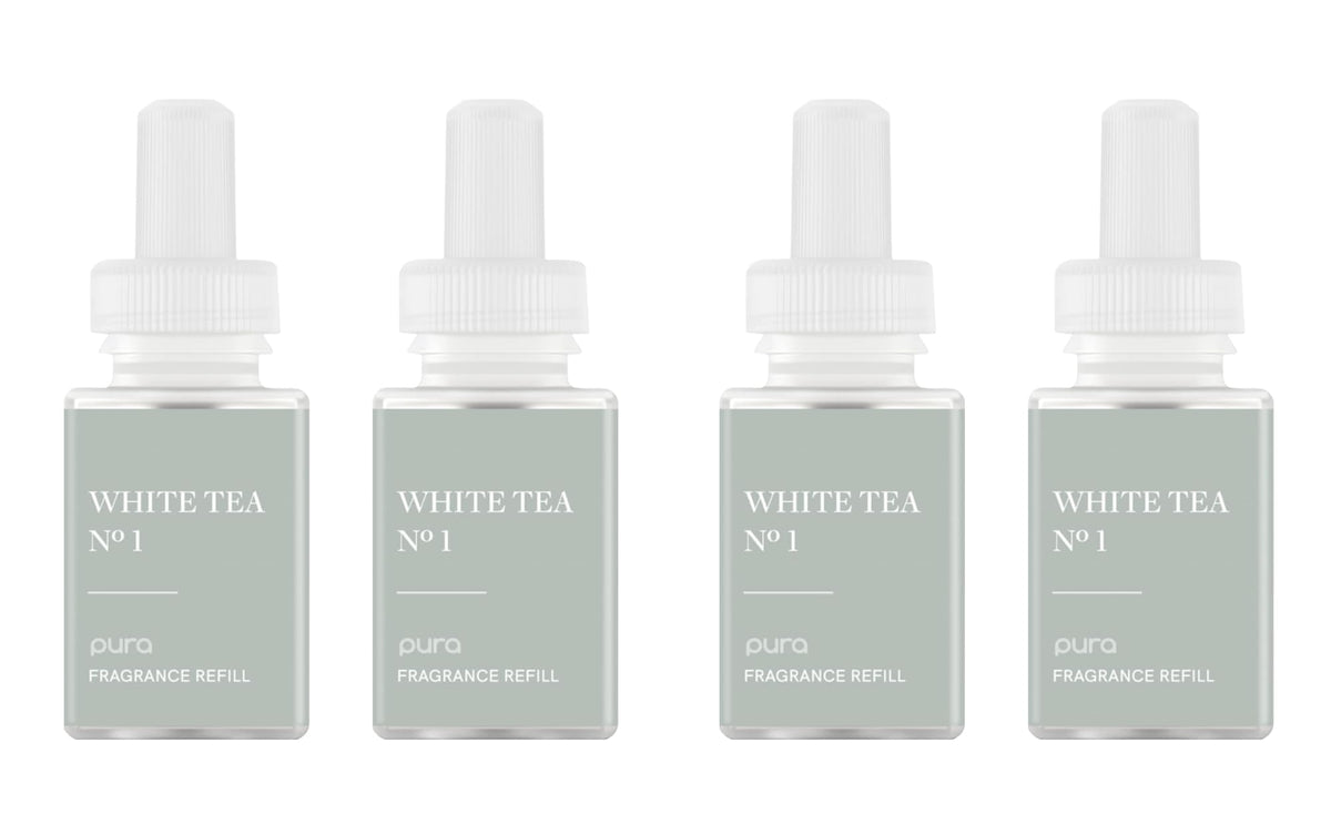 Pura diffuser with white tea blend and bergamot jasmine ambiance for spa-like ambiance.