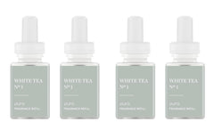 Pura diffuser with white tea blend and bergamot jasmine ambiance for spa-like ambiance.