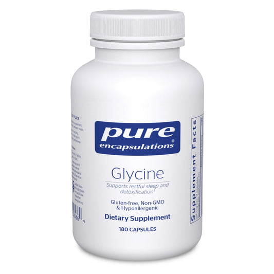Pure Encapsulations Glycine capsules bottle on table suggesting sleep support