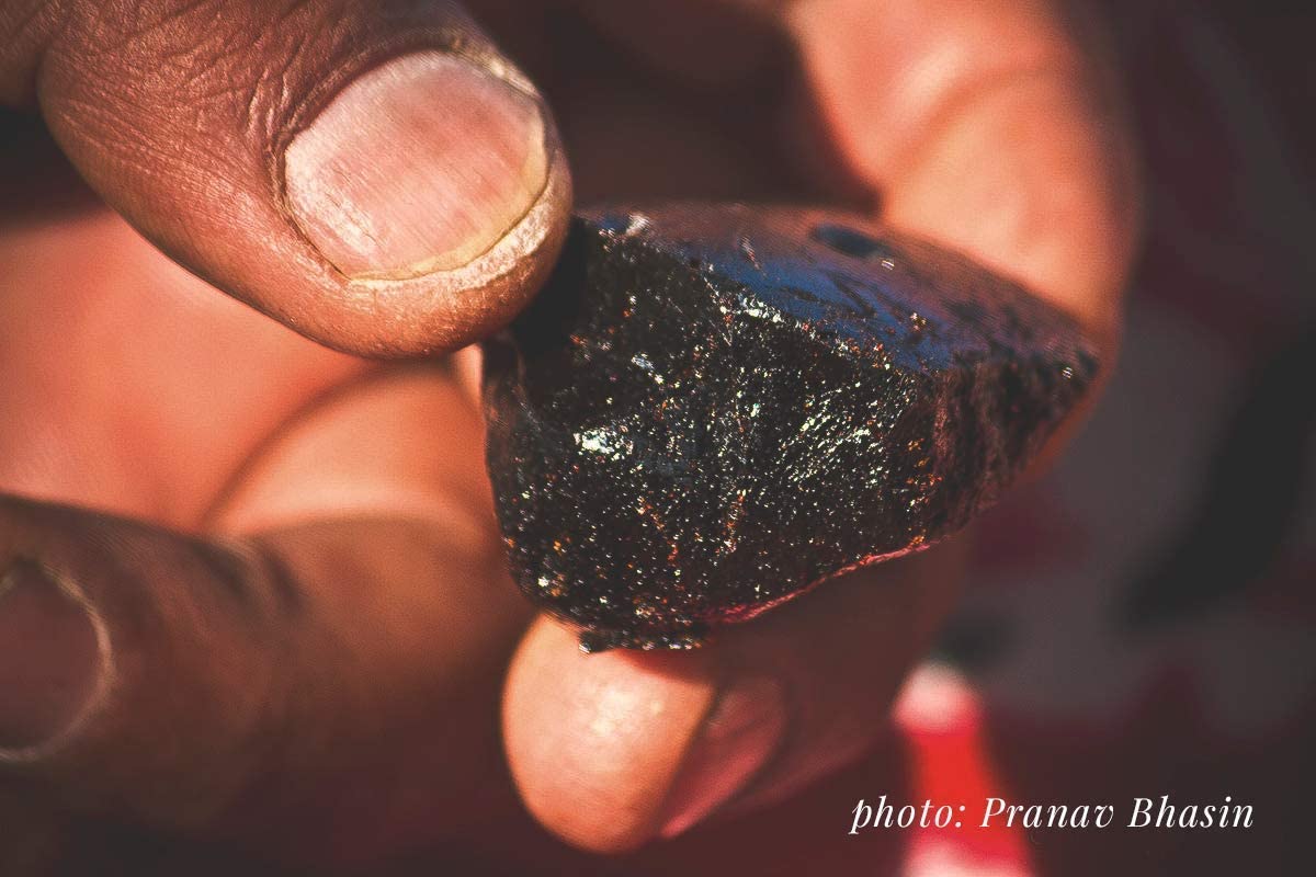 Pure Himalayan Shilajit highlights 85 plus trace minerals in dense resin texture.