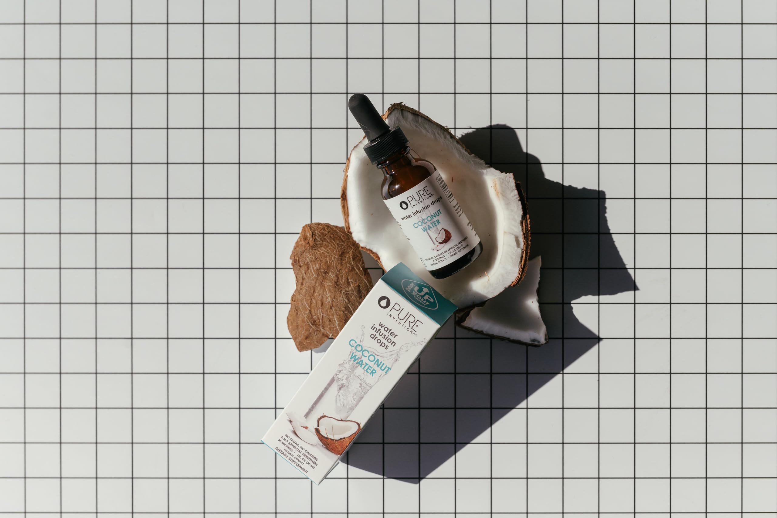 Pure Inventions Coconut Water Infusion Drops packaging emphasizes simple daily use.