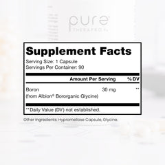 Pouring Boron capsules into hand for convenient daily use.