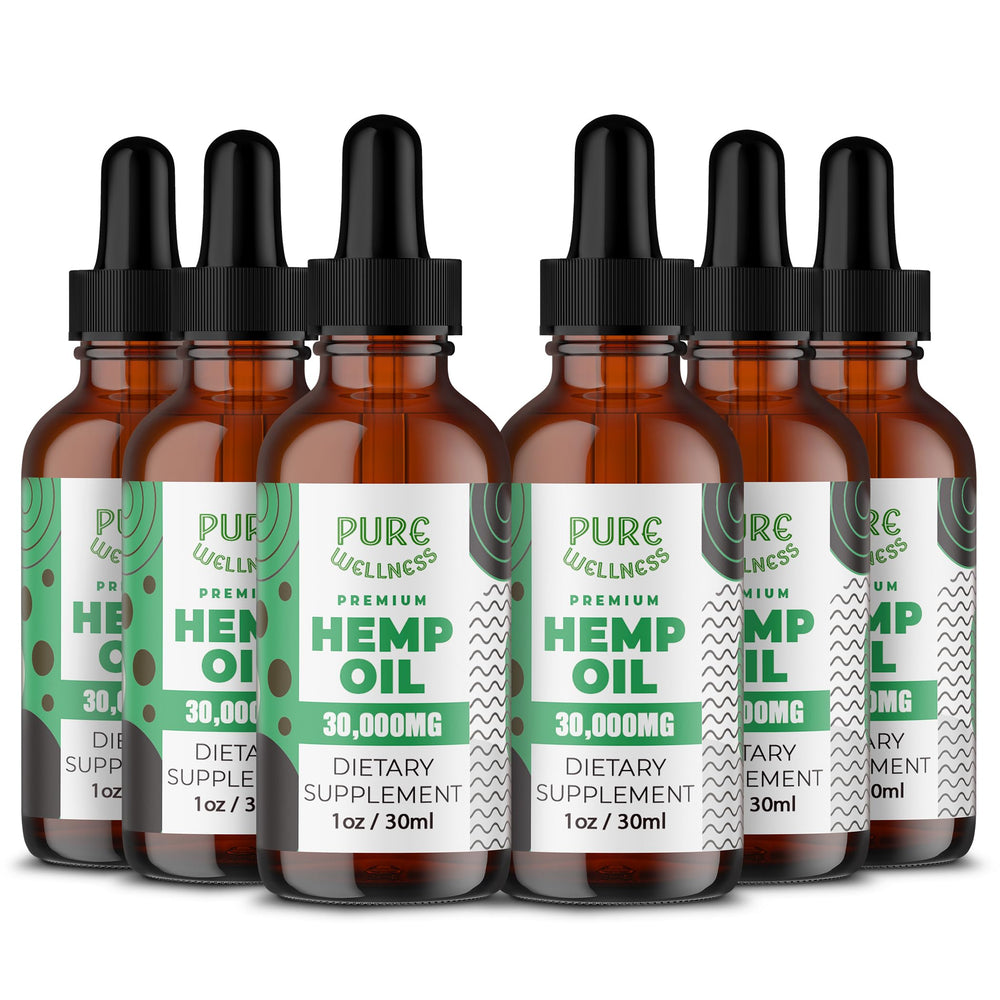 Pure Wellness hemp seed oil bottle pour supports daily wellness and balance.