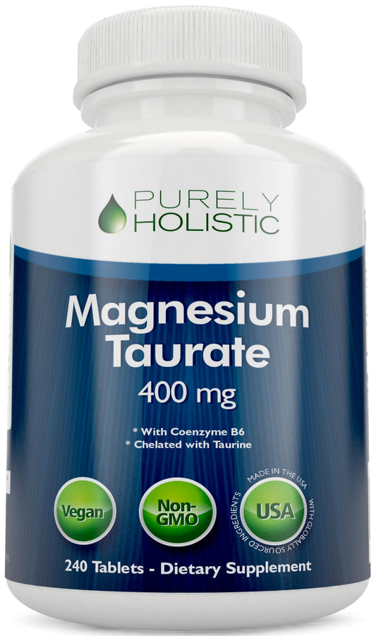 Purely Holistic Magnesium Taurate 400mg bottle on desk, supports daily energy and muscle function.
