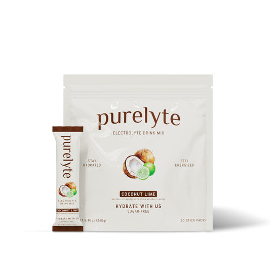 Purelyte Electrolyte Stick Coconut Lime being poured into water for on-the-go hydration