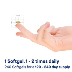 Puritan's Pride CoQ10 softgels in hand for easy daily use.