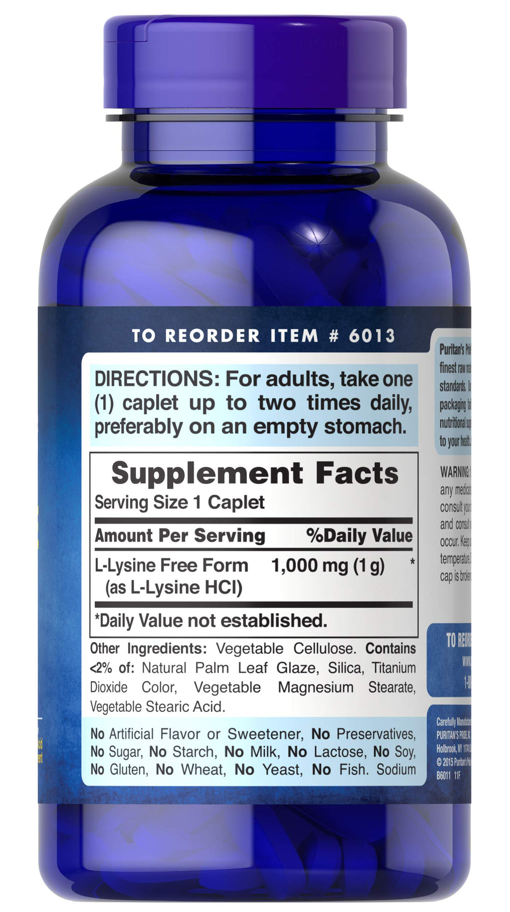 Puritan's Pride L-Lysine caplets close-up, gluten- and soy-free vegetarian formula.