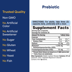 Puritan's Pride Prebiotics bottle on a desk suggests routine integration.