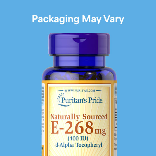 Puritan's Pride Vitamin E 400 IU softgels closeup emphasizing easy daily intake.