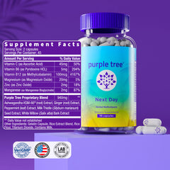 Purple Tree Next Day bottle with water beside capsules.