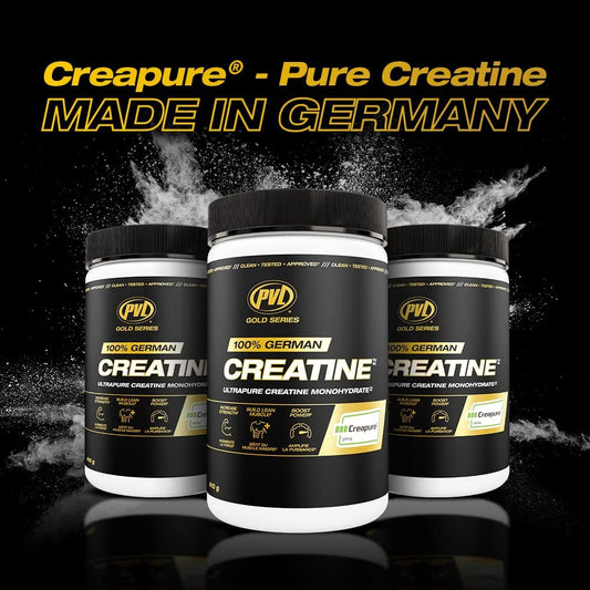 PVL Creapure Creatine scoop beside the container ready to mix for training