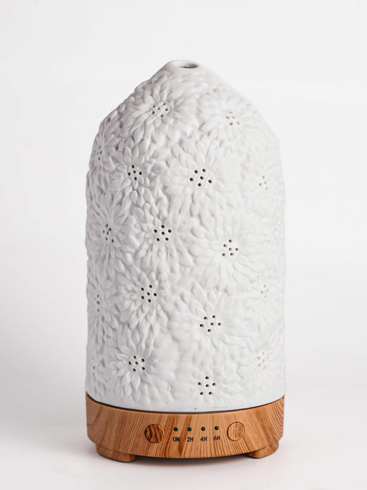 QCYBDGLOV Sunflower ceramic diffuser front view for elegant decor and fragrance.