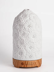 QCYBDGLOV Sunflower ceramic diffuser front view for elegant decor and fragrance.