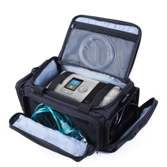 Qixotrz CPAP travel bag side pockets organize hoses and supplies for travel.