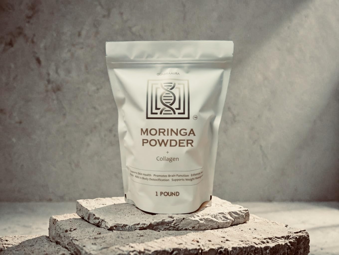 QuadraAura Moringa + Collagen Powder pour reveals earthy, unsweetened mix ready to blend