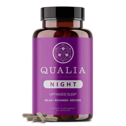 Qualia Night Sleep Aid bottle with label signals science-backed, non-habit forming sleep support.